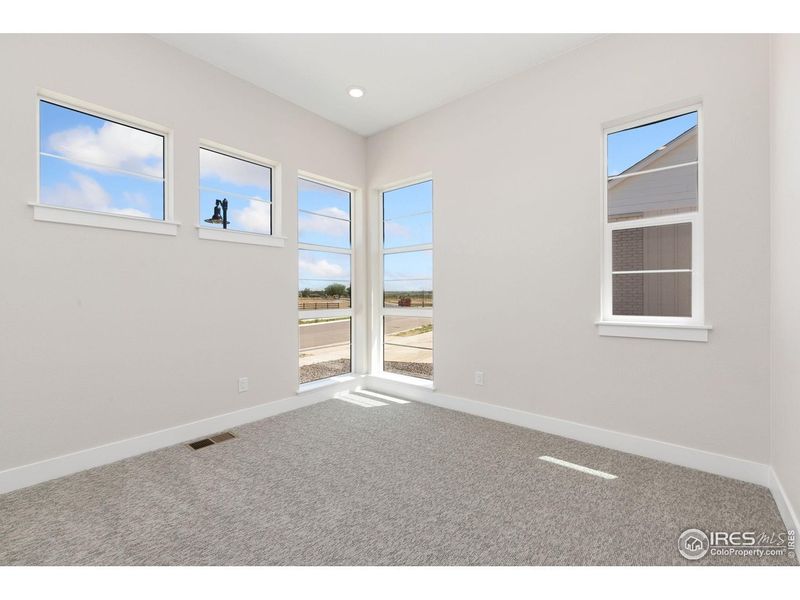 Spacious, unfurnished interior of a new home in Kitchel Lake at Serratoga Falls, Timnath (Image 14).