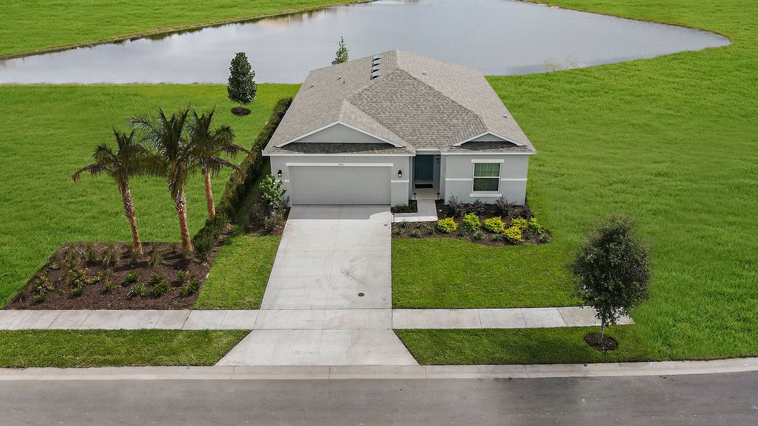 Representative exterior photo of a completed home built from the Goldfinch by Taylor Morrison in Solena, North Fort Myers, FL (Image 7).