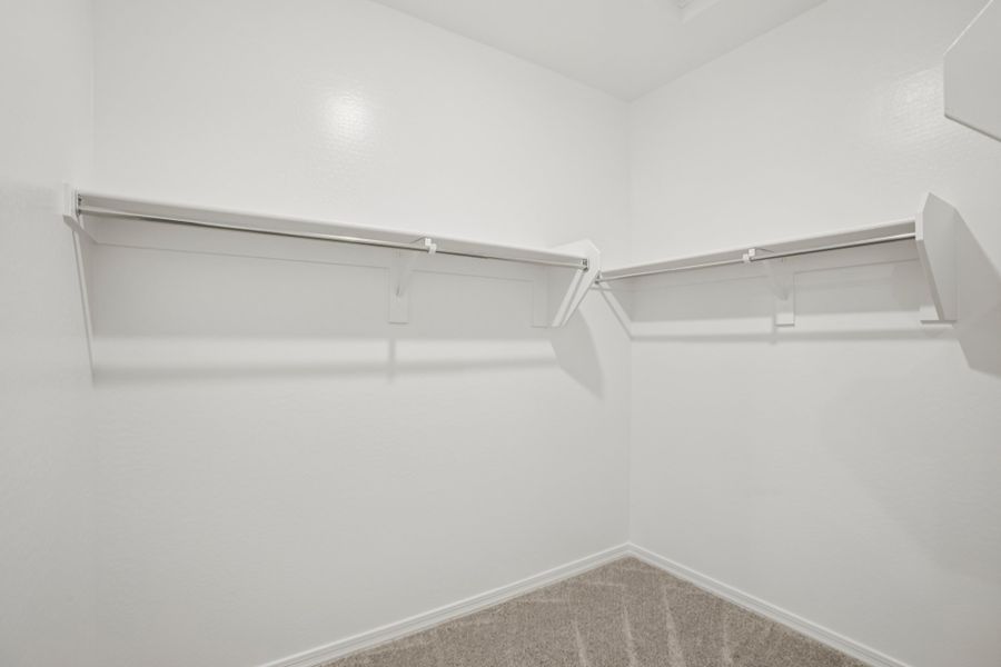 Primary walk in closet. Finishes and options may vary by community
