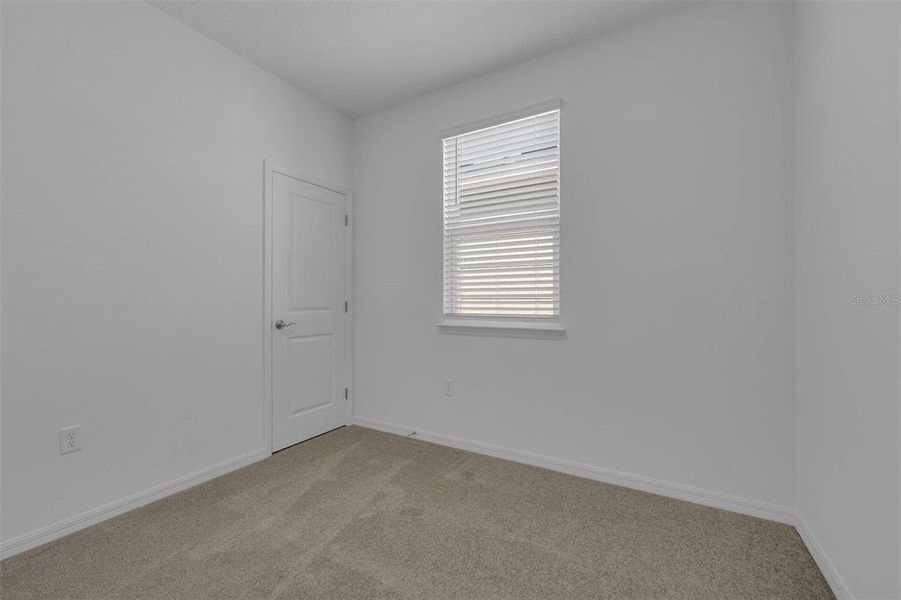 Spacious, unfurnished interior of a new home in Brack Ranch, St. Cloud (Image 29).