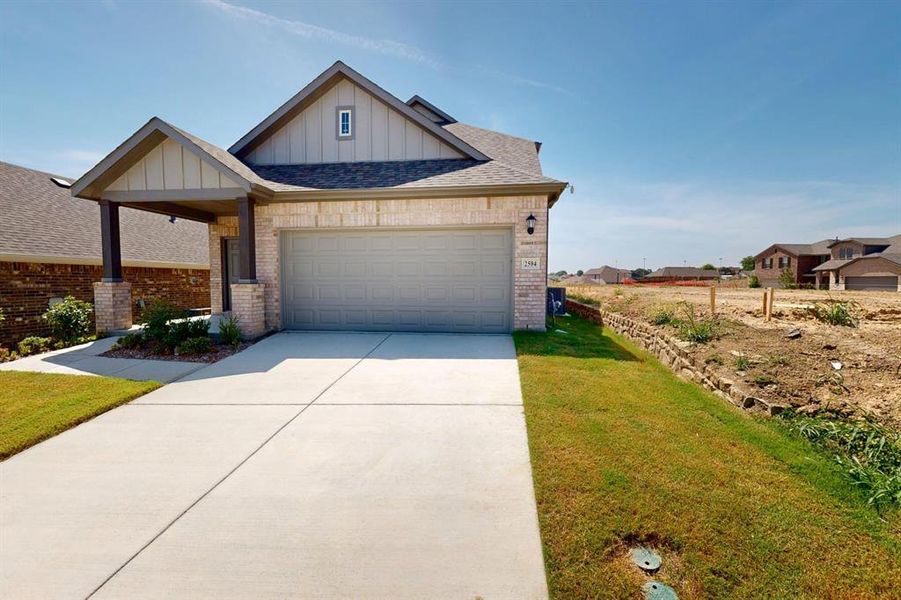 Front exterior of a new home in ValleyBrooke, Mesquite, TX, highlighting curb appeal (Image 20). Front exterior of a new home in ValleyBrooke, Mesquite, TX, highlighting curb appeal (Image 20).
