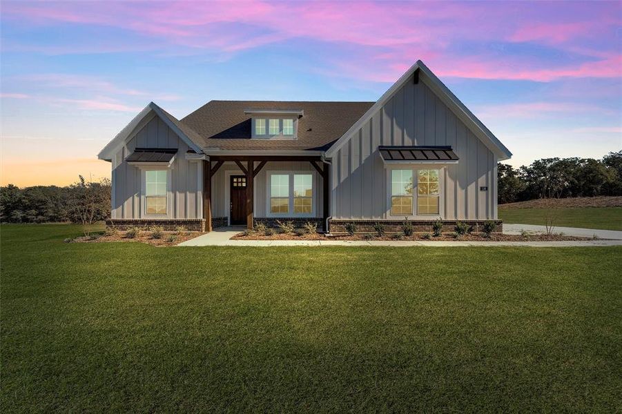 Front exterior of a new home in Oak Grove Addition, Springtown, TX, highlighting curb appeal (Image 1). Front exterior of a new home in Oak Grove Addition, Springtown, TX, highlighting curb appeal (Image 1).