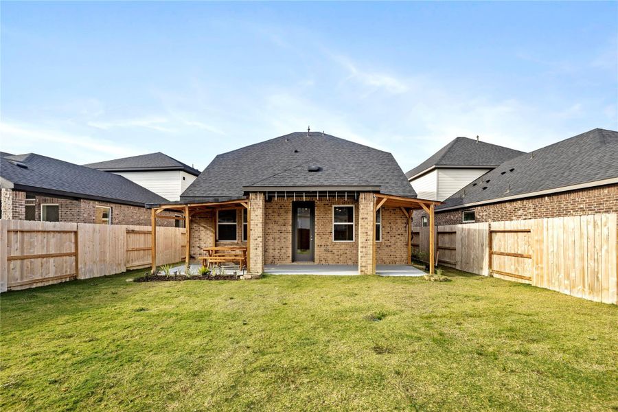 Exterior details and patio area of a home in Avalon at Cypress 40s, Cypress (Image 3).