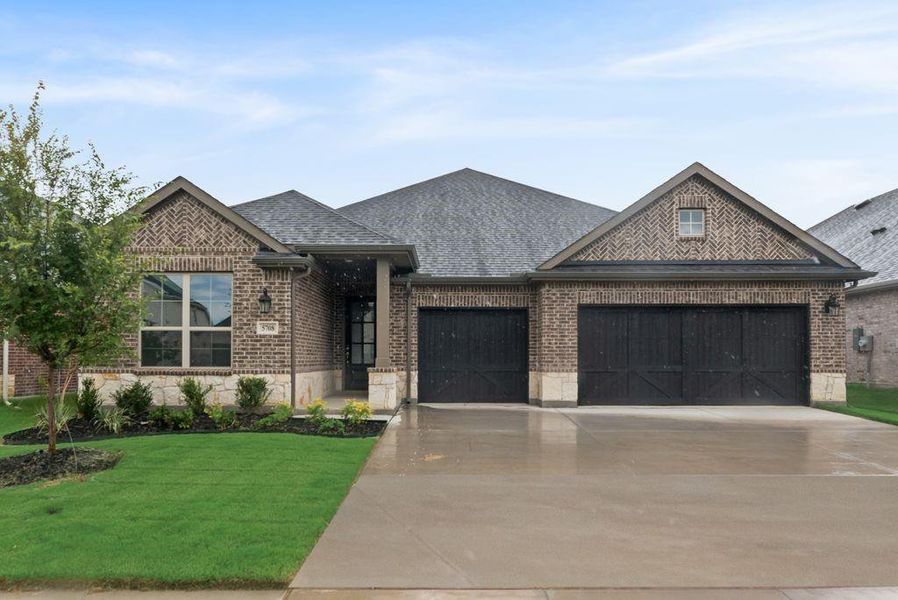 Front exterior of a new home in Sutton Fields, Celina, TX, highlighting curb appeal (Image 20). Front exterior of a new home in Sutton Fields, Celina, TX, highlighting curb appeal (Image 20).