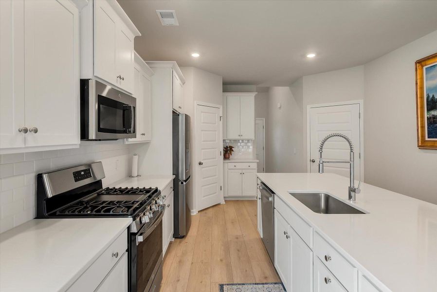 Furnished interior view inside a new home in Horizons at Summers Corner | 55+, Summerville (Image 17).