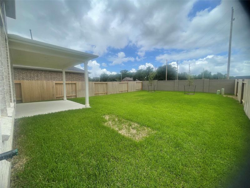 Front exterior of a new home in Ellerden, Tomball, TX, highlighting curb appeal (Image 16). Front exterior of a new home in Ellerden, Tomball, TX, highlighting curb appeal (Image 16).