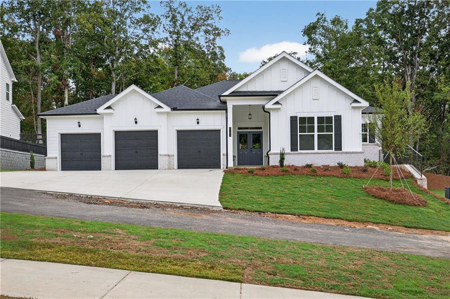 Front exterior of a new home in , Gainesville, GA, highlighting curb appeal (Image 1).