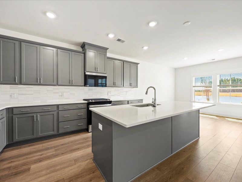 Furnished interior view inside a new home in The Coves at Lakes of Cane Bay II, Summerville (Image 5).