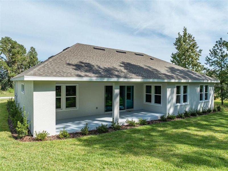 Exterior details and patio area of a home in Southern Hills Plantation, Brooksville (Image 4).