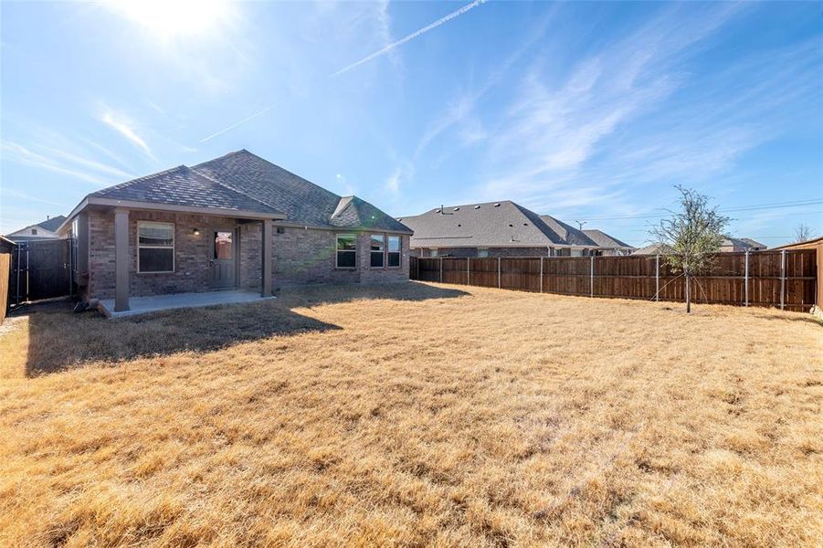 Exterior details and patio area of a home in Light Farms - Sweetwater, Celina (Image 14).