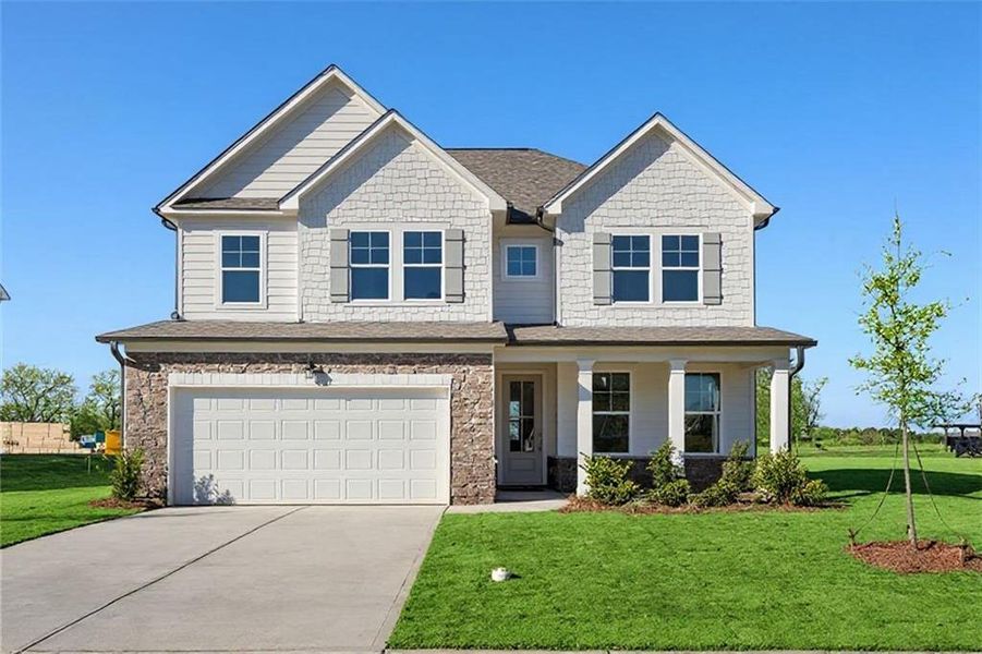 Front exterior of a new home in Wehunt Meadows, Hoschton, GA, highlighting curb appeal (Image 8).