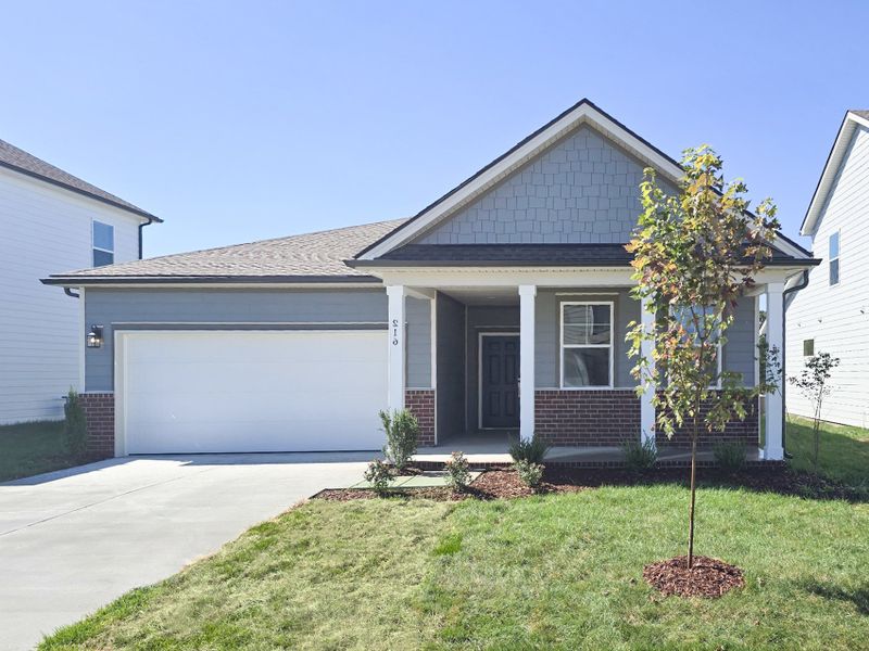 Front exterior of a new home in Barton Hills, Spring Hill, TN, highlighting curb appeal (Image 1).