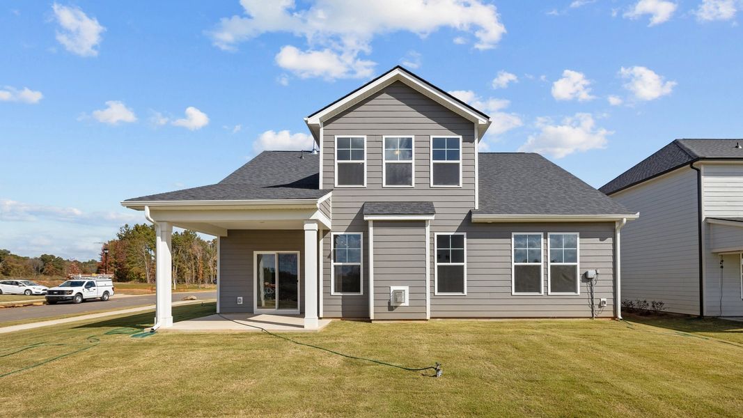 Fairfield design rear elevation with covered rear porch at Lakeside Glen by premier builder DRB Homes, York, SC.