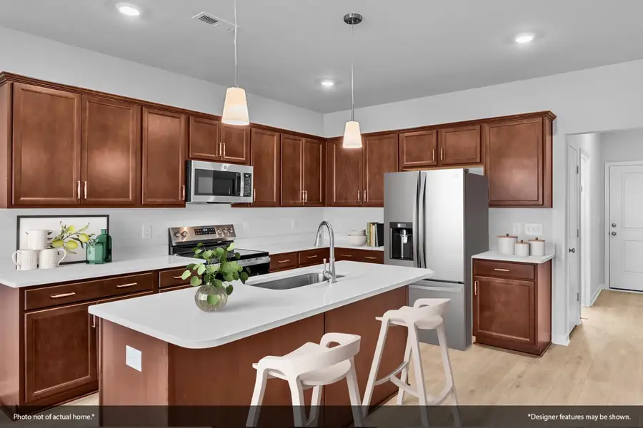 Furnished interior view inside a new home in Ovation at Sweetbrier, Durham (Image 5).