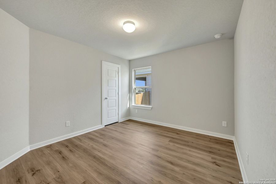 Spacious, unfurnished interior of a new home in Winding Brook, San Antonio (Image 32).