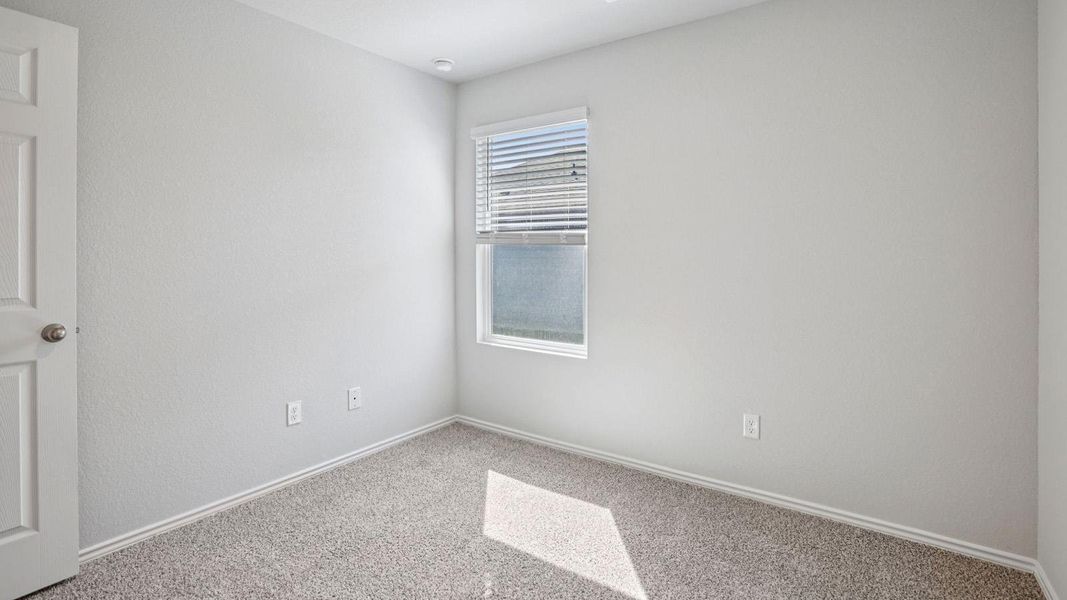 A well-lit, quiet space offers versatility for a bedroom or office, complete with soft carpeting. A well-lit, quiet space offers versatility for a bedroom or office, complete with soft carpeting.