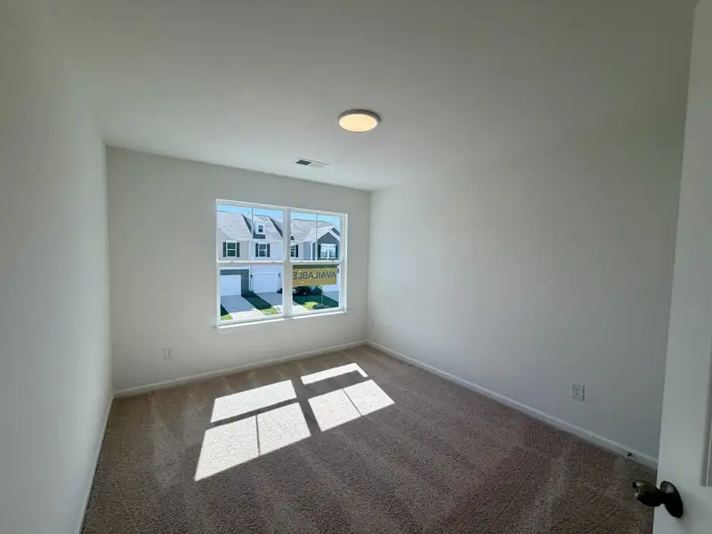 Spacious, unfurnished interior of a new home in Bellevue Townhomes, Greenville (Image 9). Spacious, unfurnished interior of a new home in Bellevue Townhomes, Greenville (Image 9).