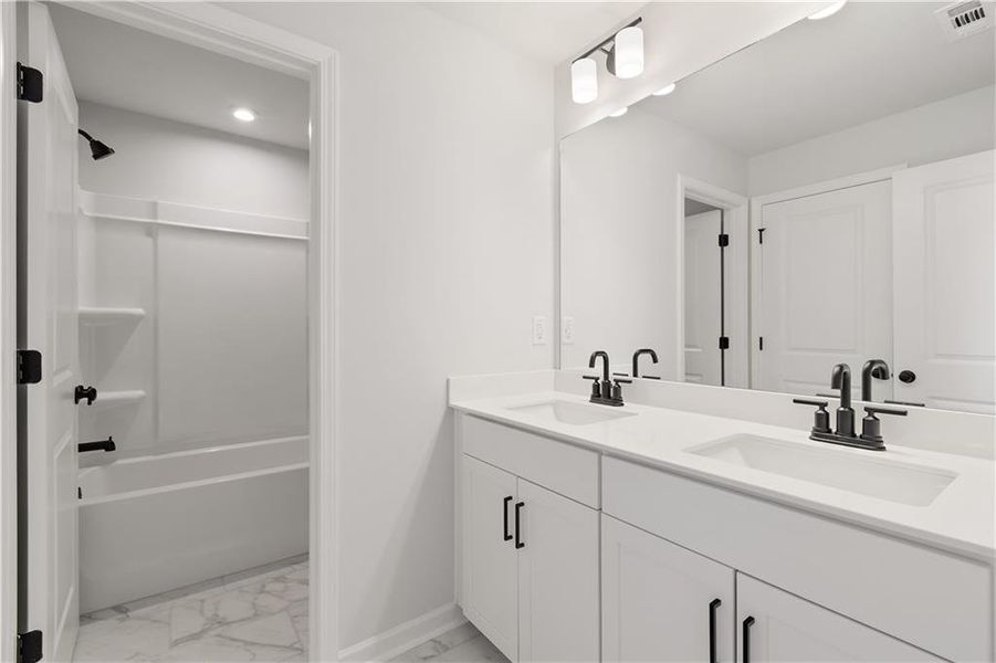 Furnished interior view inside a new home in Hillside Manor, Powder Springs (Image 4). Furnished interior view inside a new home in Hillside Manor, Powder Springs (Image 4).