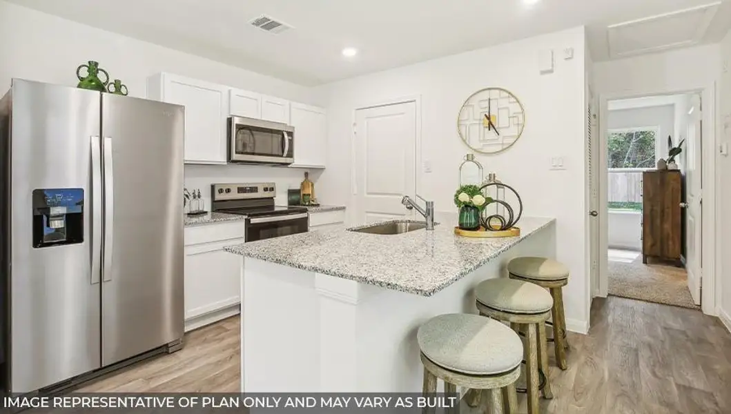 Furnished interior view inside a new home in William Trails, Willis (Image 6).