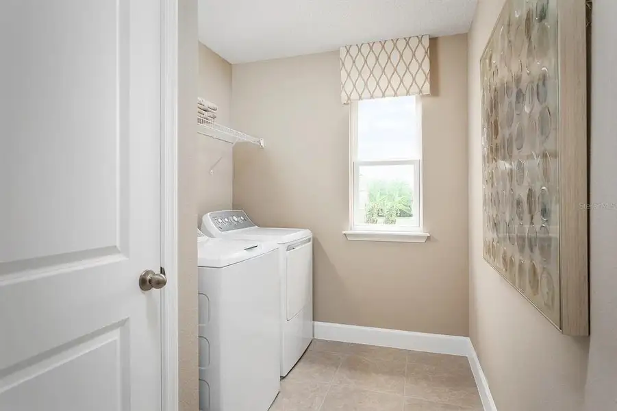 Furnished interior view inside a new home in Parkview Preserve, Apopka (Image 5). Furnished interior view inside a new home in Parkview Preserve, Apopka (Image 5).