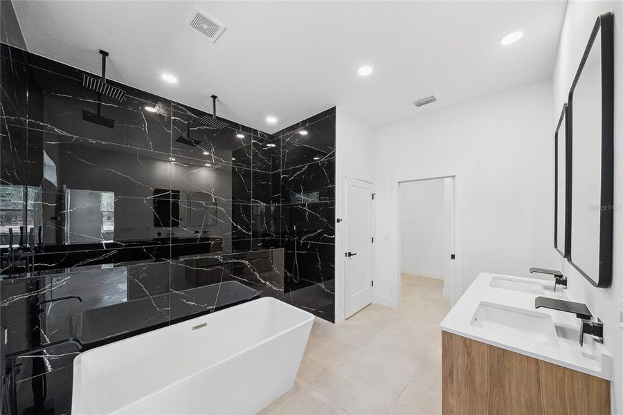 Spa-like Bathroom with Shower and Soaking Tub.