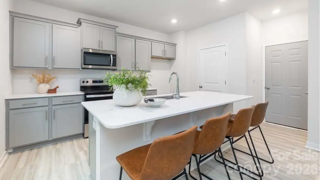 Furnished interior view inside a new home in Reedy Creek Preserve, Charlotte (Image 5).
