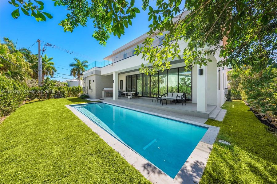 Exterior details and patio area of a home in , Miami Beach (Image 39). Exterior details and patio area of a home in , Miami Beach (Image 39).