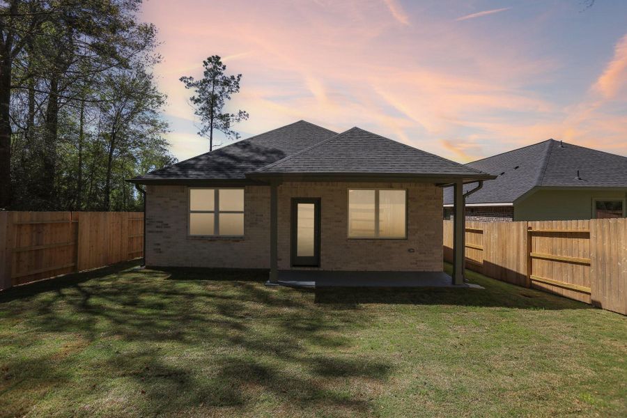 Exterior details and patio area of a home in Woodhavyn 40', Magnolia (Image 22).