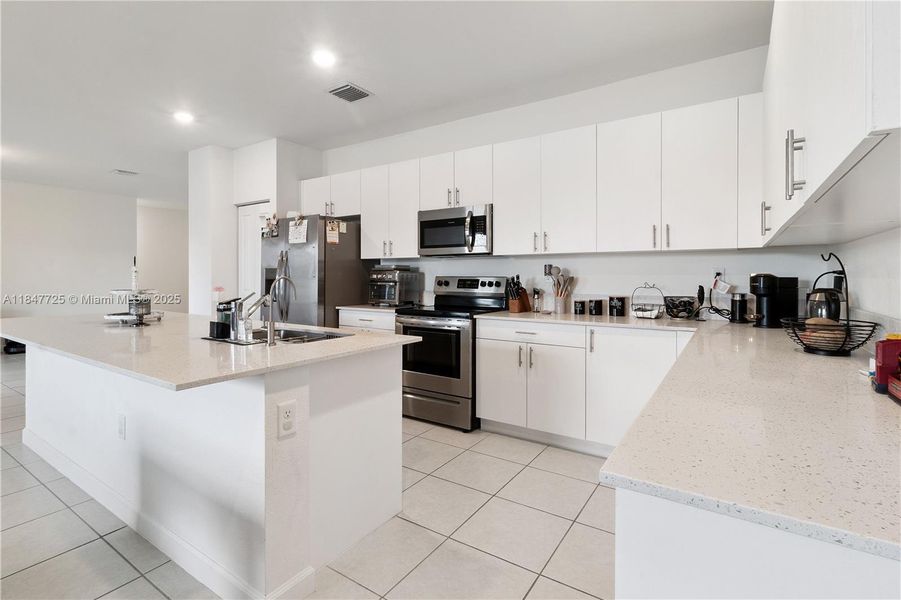 Furnished interior view inside a new home in , Homestead (Image 9). Furnished interior view inside a new home in , Homestead (Image 9).