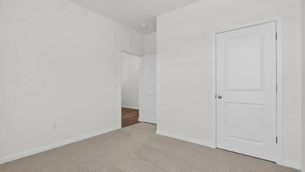 Spacious, unfurnished interior of a new home in Honeycutt Oaks, Angier (Image 24).