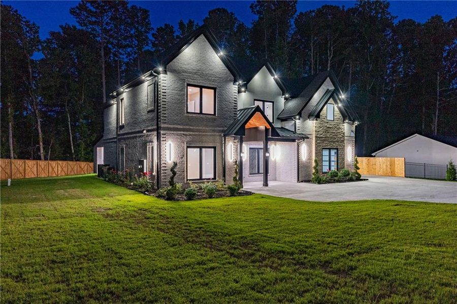 Front exterior of a new home in , Lawrenceville, GA, highlighting curb appeal (Image 37). Front exterior of a new home in , Lawrenceville, GA, highlighting curb appeal (Image 37).