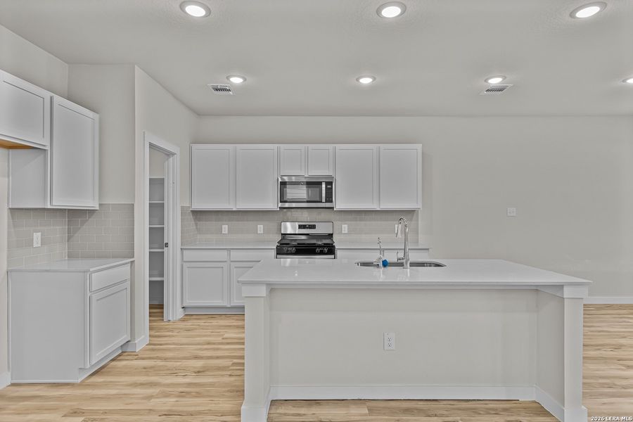 Furnished interior view inside a new home in Summerlin, San Antonio (Image 5).
