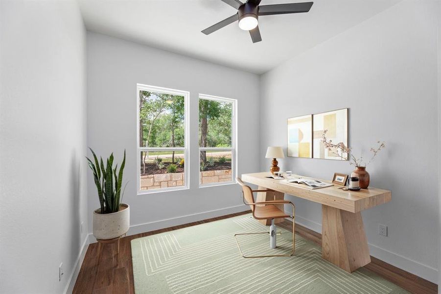 first floor office space with ceiling fan, baseboards, and wood finished floors