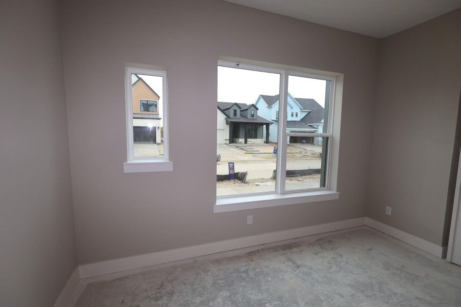 Spacious, unfurnished interior of a new home in Bridgeland Central: Emerald Heights - Cottages Row Collection, Cypress (Image 10).