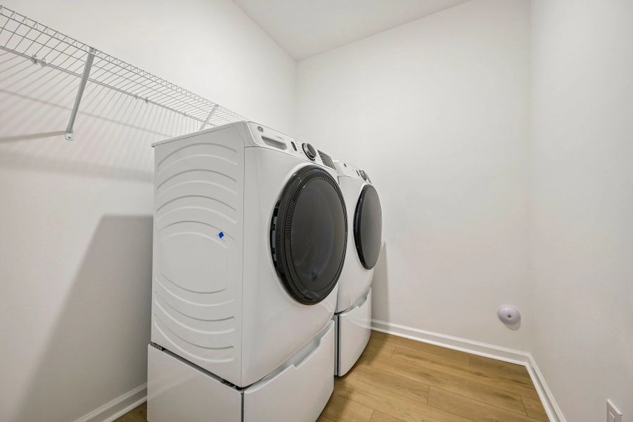 Laundry Room featuring the AW Collection® Sapphire - Bright whites and cool contrast keep it crisp. Laundry Room featuring the AW Collection® Sapphire - Bright whites and cool contrast keep it crisp.