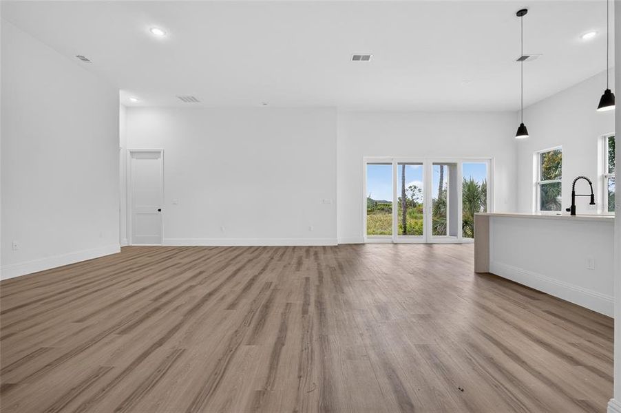 Spacious, unfurnished interior of a new home in , Port Charlotte (Image 36).