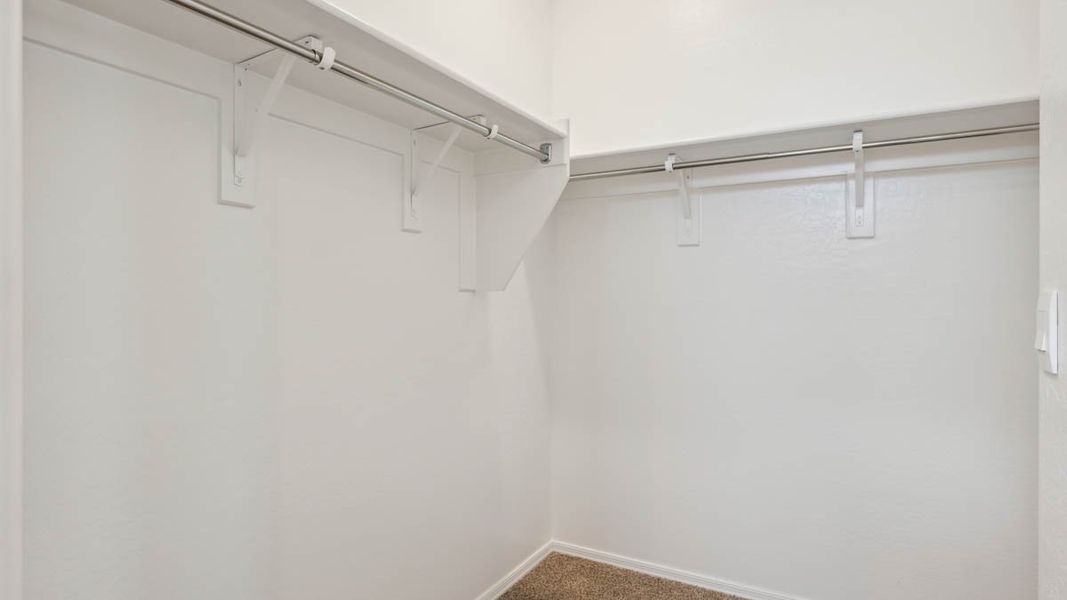 Representative unfurnished interior of a home built from the Puffin by D.R. Horton in Moonlight, Maricopa (Image 22).