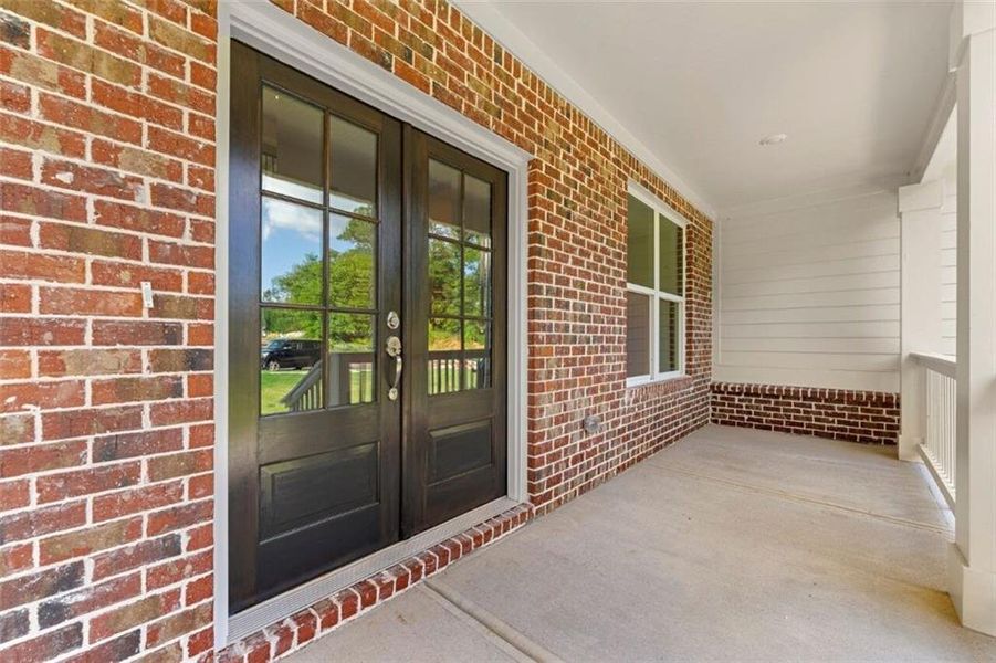 Exterior details and patio area of a home in Steeplechase, Hoschton (Image 23).