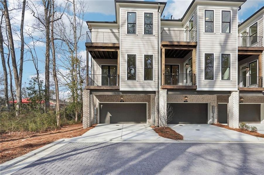 Front exterior of a new home in Byers Park, Alpharetta, GA, highlighting curb appeal (Image 34).
