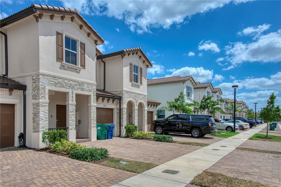 Front exterior of a new home in , Miami, FL, highlighting curb appeal (Image 1). Front exterior of a new home in , Miami, FL, highlighting curb appeal (Image 1).