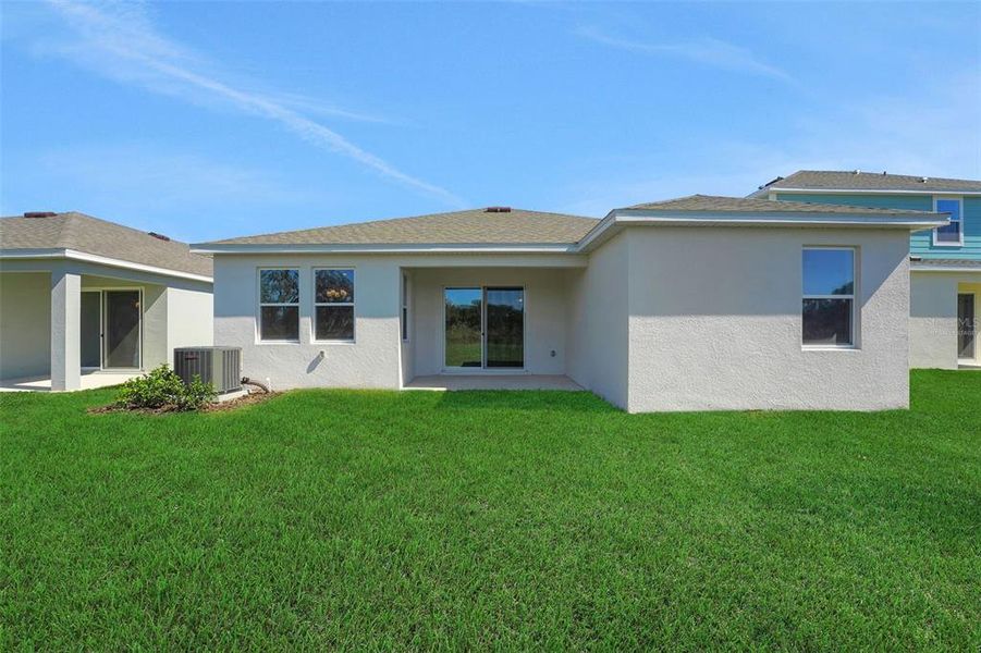 Exterior details and patio area of a home in Willowbrook North, Winter Haven (Image 2).