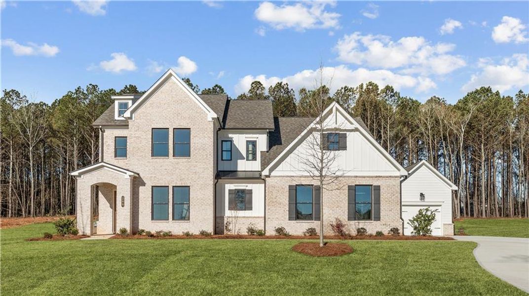 Front exterior of a new home in The Reserve at Knollwood, Canton, GA, highlighting curb appeal (Image 21).