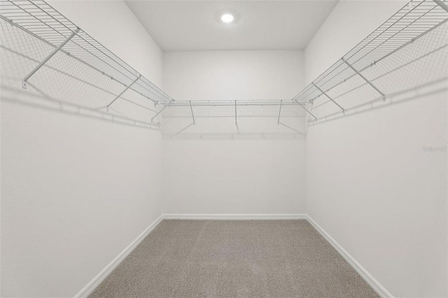 Spacious, unfurnished interior of a new home in Bradbury Creek - Signature Series, Haines City (Image 22).