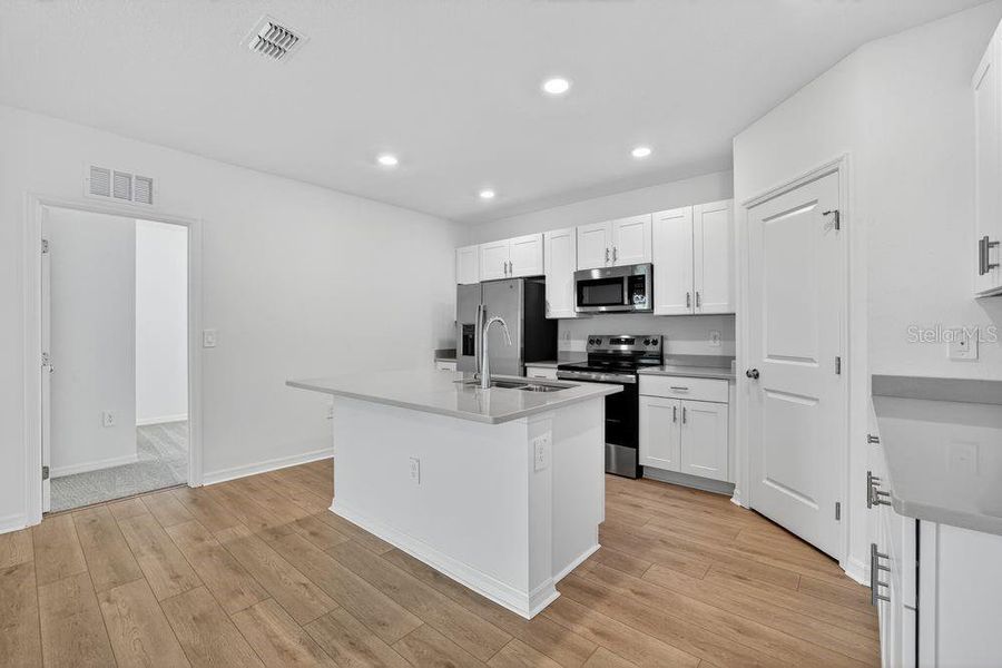 Furnished interior view inside a new home in Palm Wind, Hudson (Image 9).
