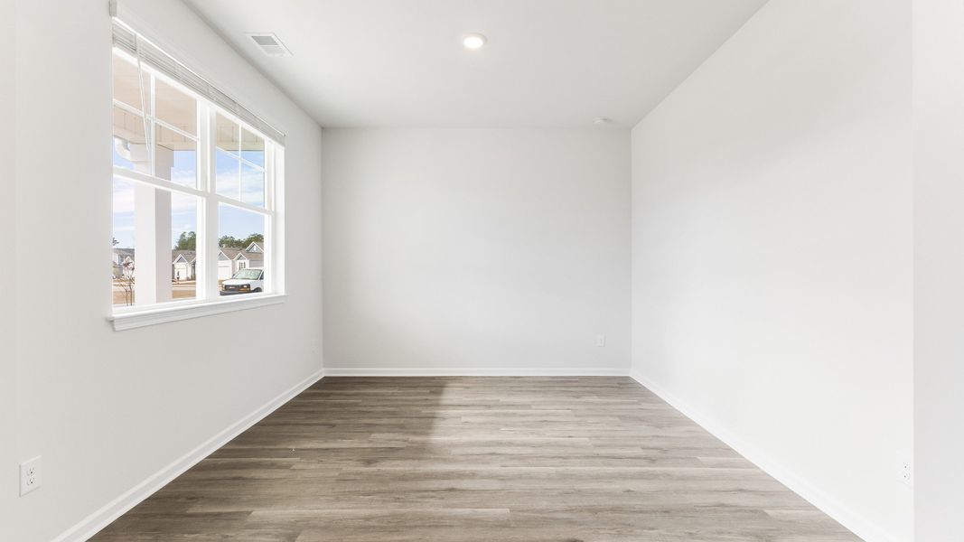 Representative unfurnished interior of a home built from the HAYDEN by D.R. Horton in Sidbury Station, Castle Hayne (Image 16).