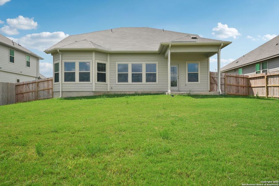 Front exterior of a new home in Legendary Trails - Classic Series, Cibolo, TX, highlighting curb appeal (Image 2). Front exterior of a new home in Legendary Trails - Classic Series, Cibolo, TX, highlighting curb appeal (Image 2).