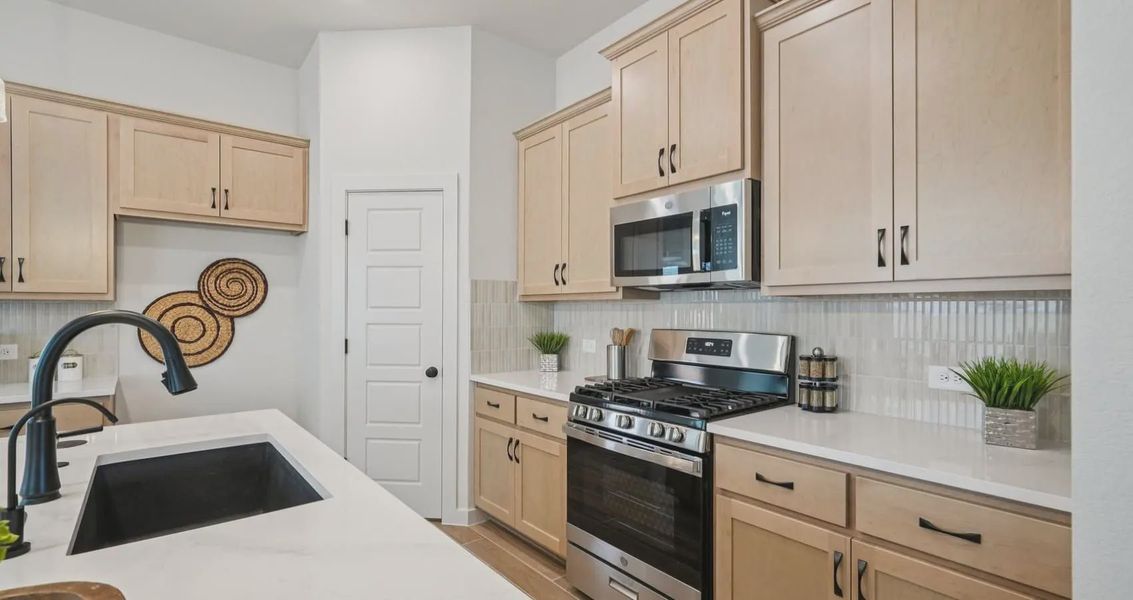 Furnished interior view inside a new home in Stream Waters, Buda (Image 9).
