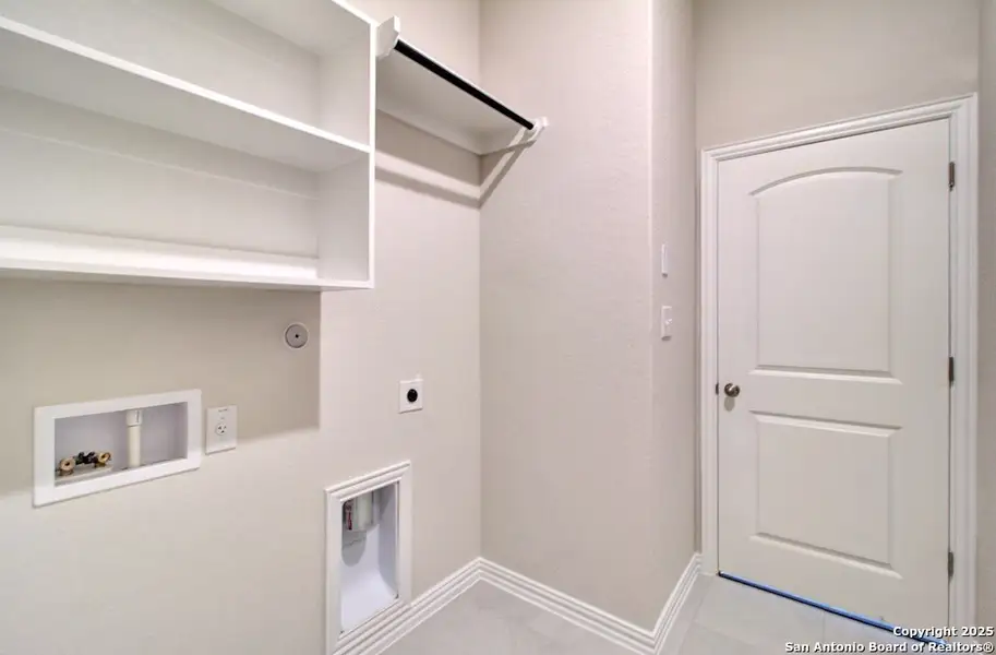 Furnished interior view inside a new home in Veranda, San Antonio (Image 3).