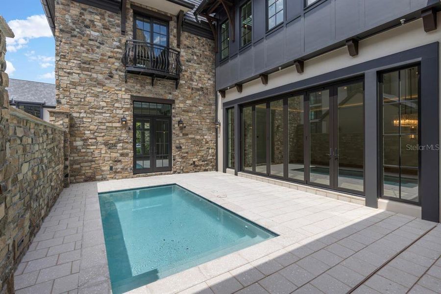 Exterior details and patio area of a home in , Orlando (Image 30).