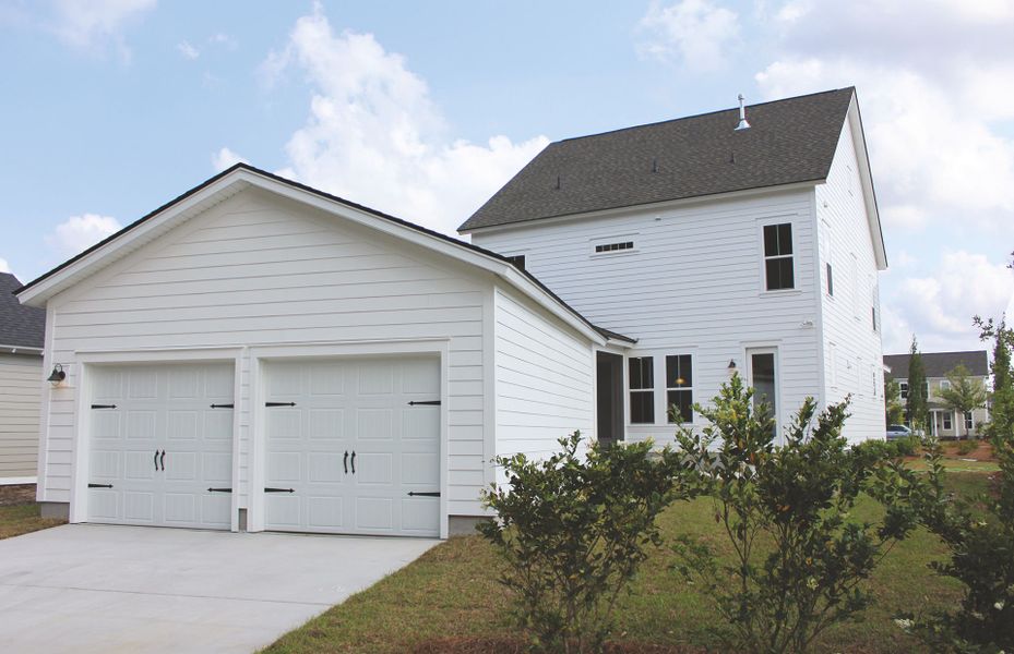 Representative exterior photo of a completed home built from the Poplar by Pulte Homes in Heartwood, Richmond Hill, GA (Image 20).